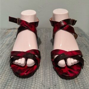 Jimmy Choo two tone Red/Black patent leather criss cross wedge sandal. Size 39
